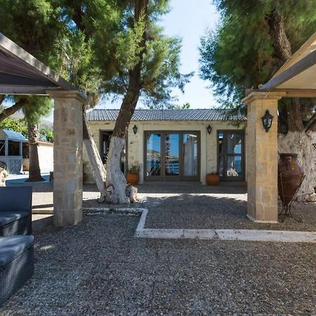 Villa Proto Helidoni - A cozy beachfront Villa Petres  Esterno foto