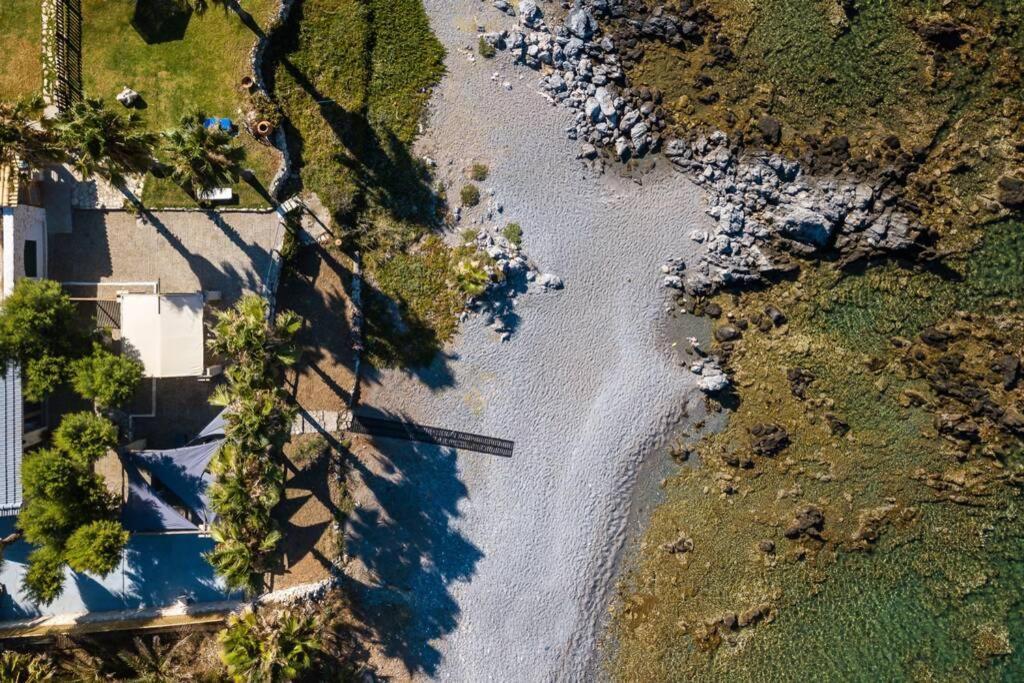 Villa Proto Helidoni - A cozy beachfront Villa Petres  Esterno foto